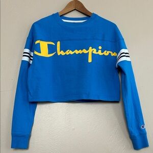 Champion Women’s Blue Cropped Sweatshirt with Yellow Logo. Size XSmall.